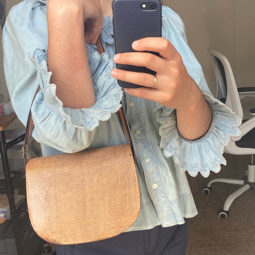 snake skin covered purse
